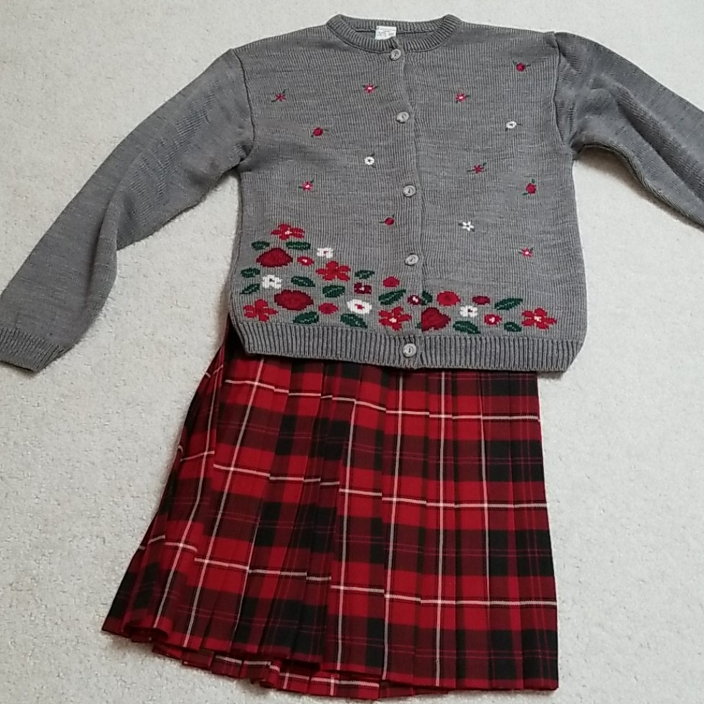 Two piece skirt and sweater set.